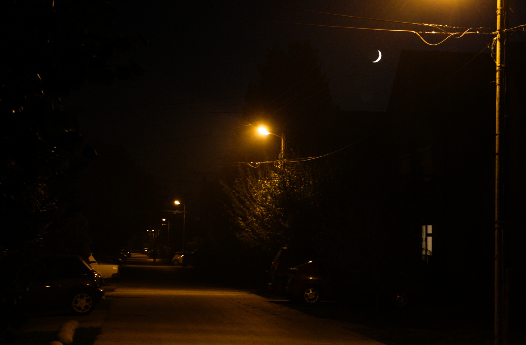 I shot this for the young moon. The shop window is on the right.